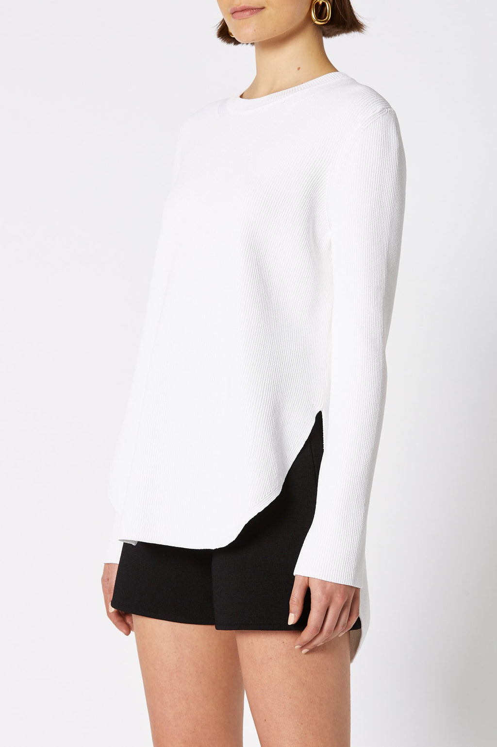 CREPE KNIT SHIRT TAIL SWEATER